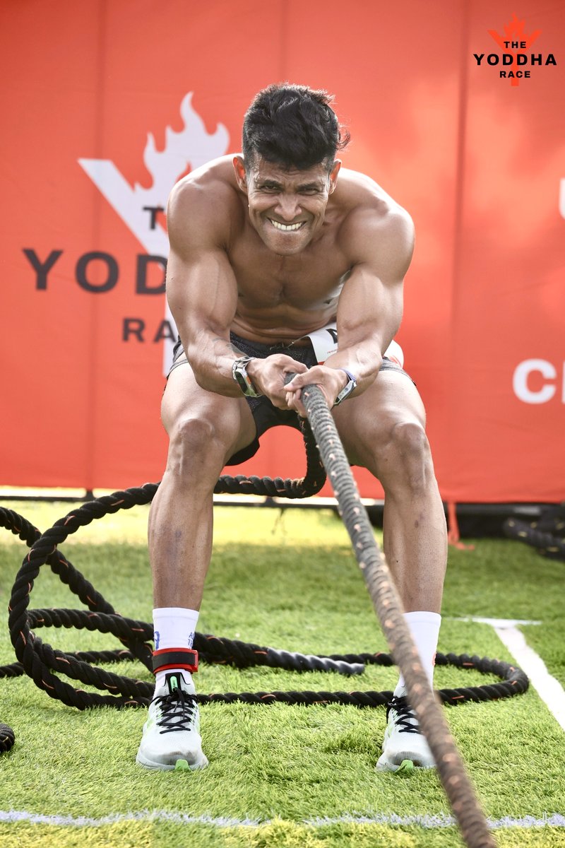 Coach Joby doing a sled pull
